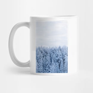 Trees covered in snow Mug